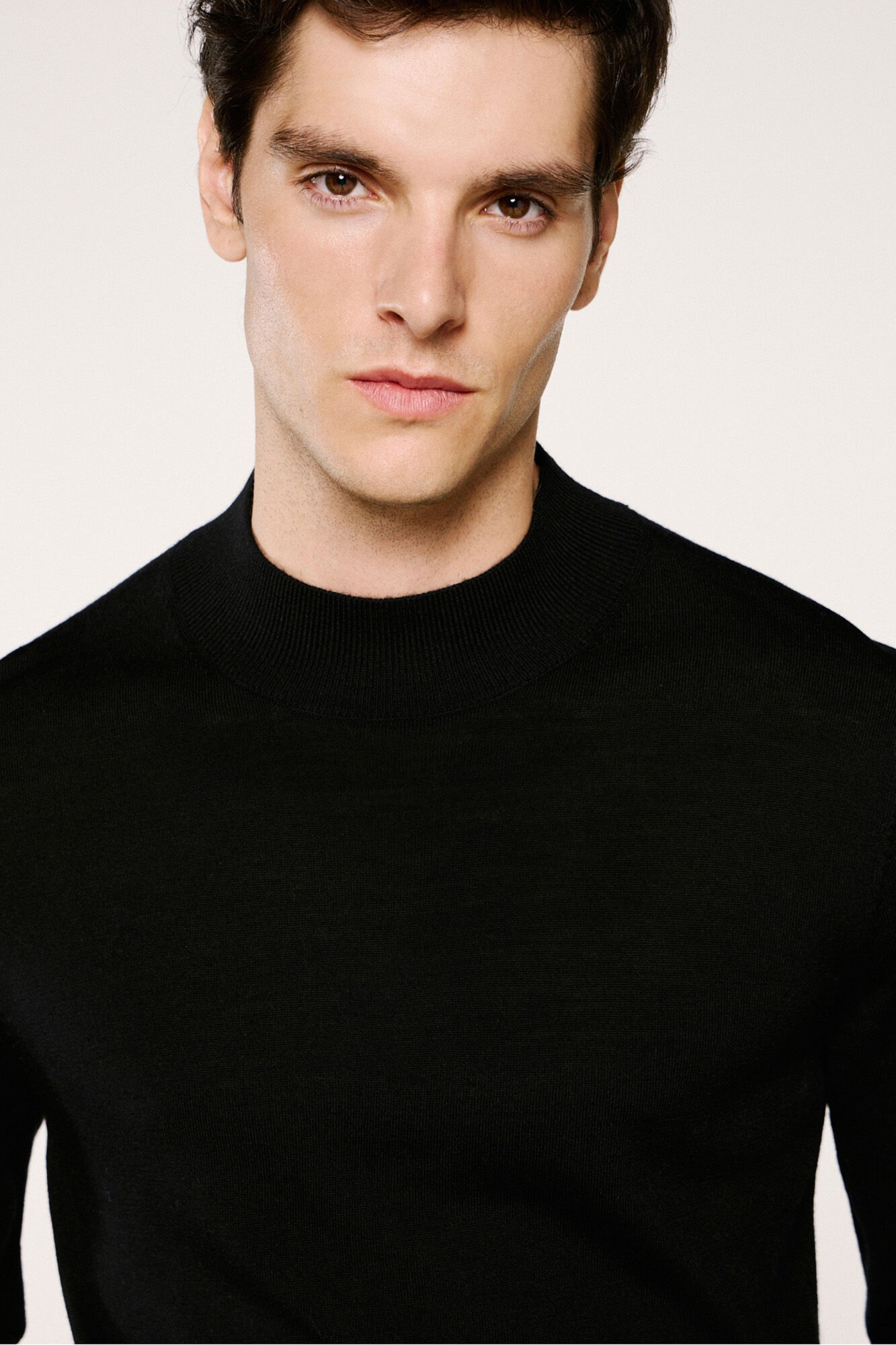 Selected 100% merino wool mock neck jumper . Black
