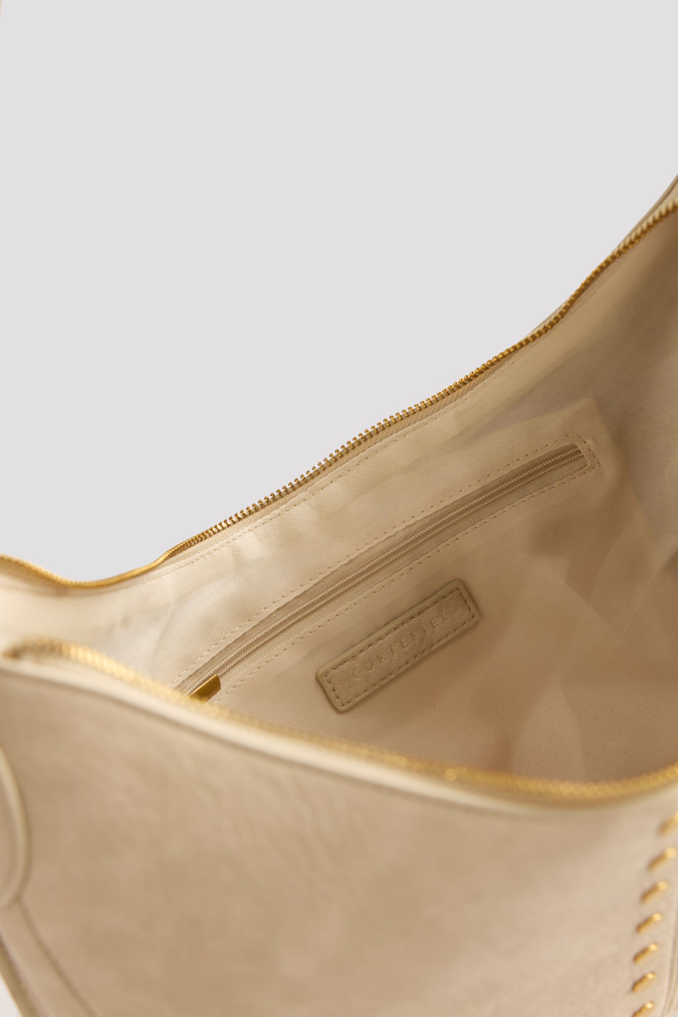 Cortefiel Crossbody bag with studs Ivory