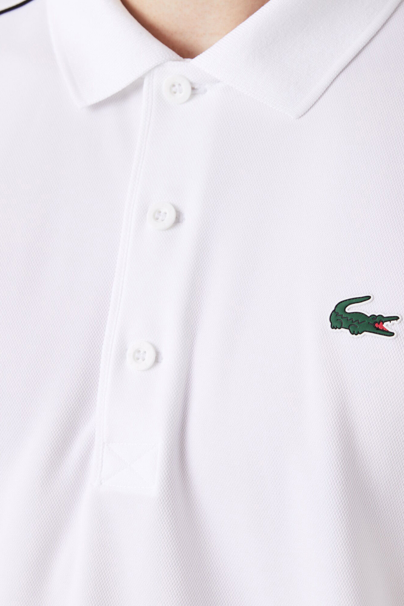 Lacoste Debrum contrastante nos ombros e nas extremidades das mangas