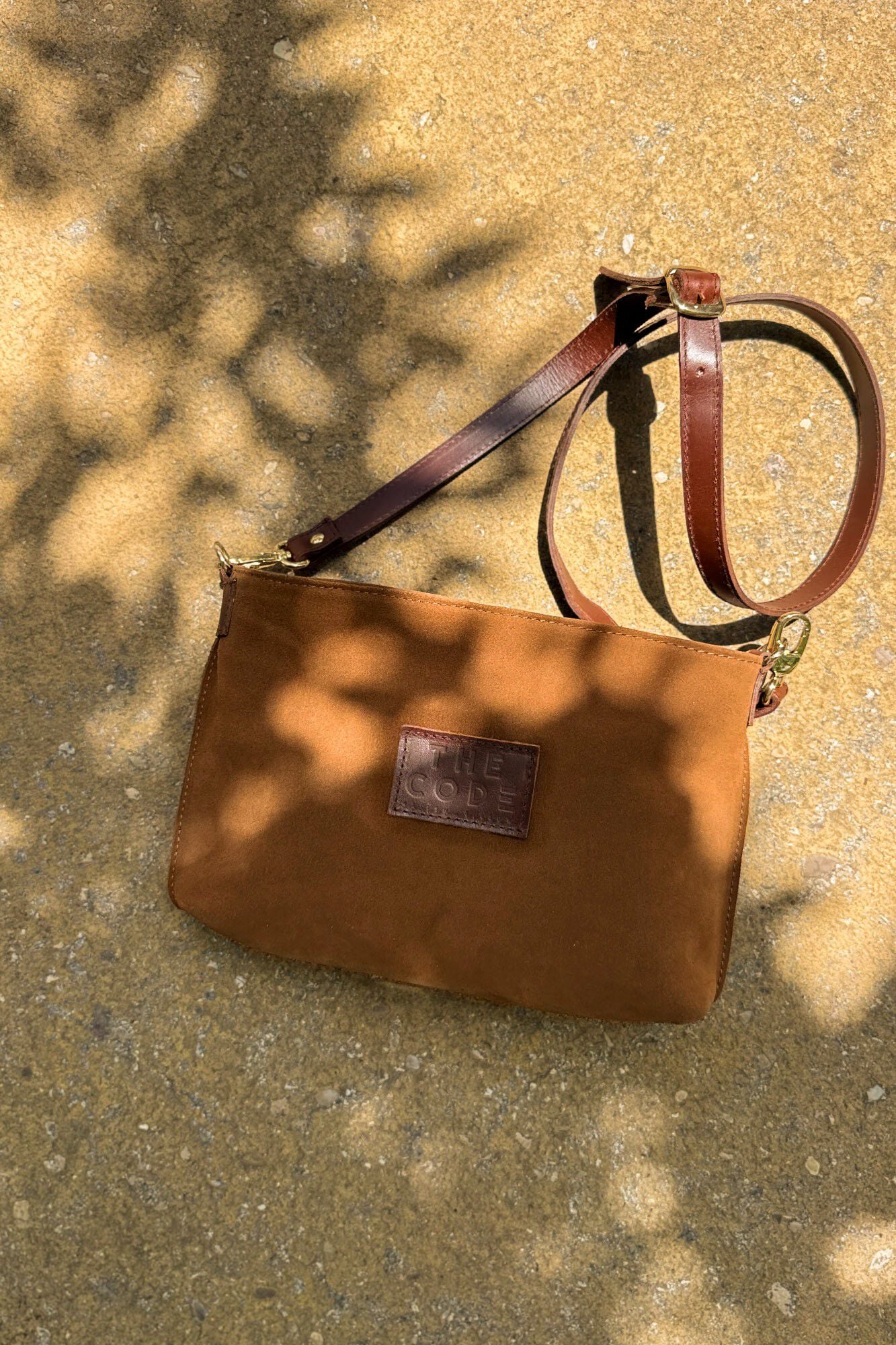 The Code Bolsa a tiracolo Dakota em croute Castanho