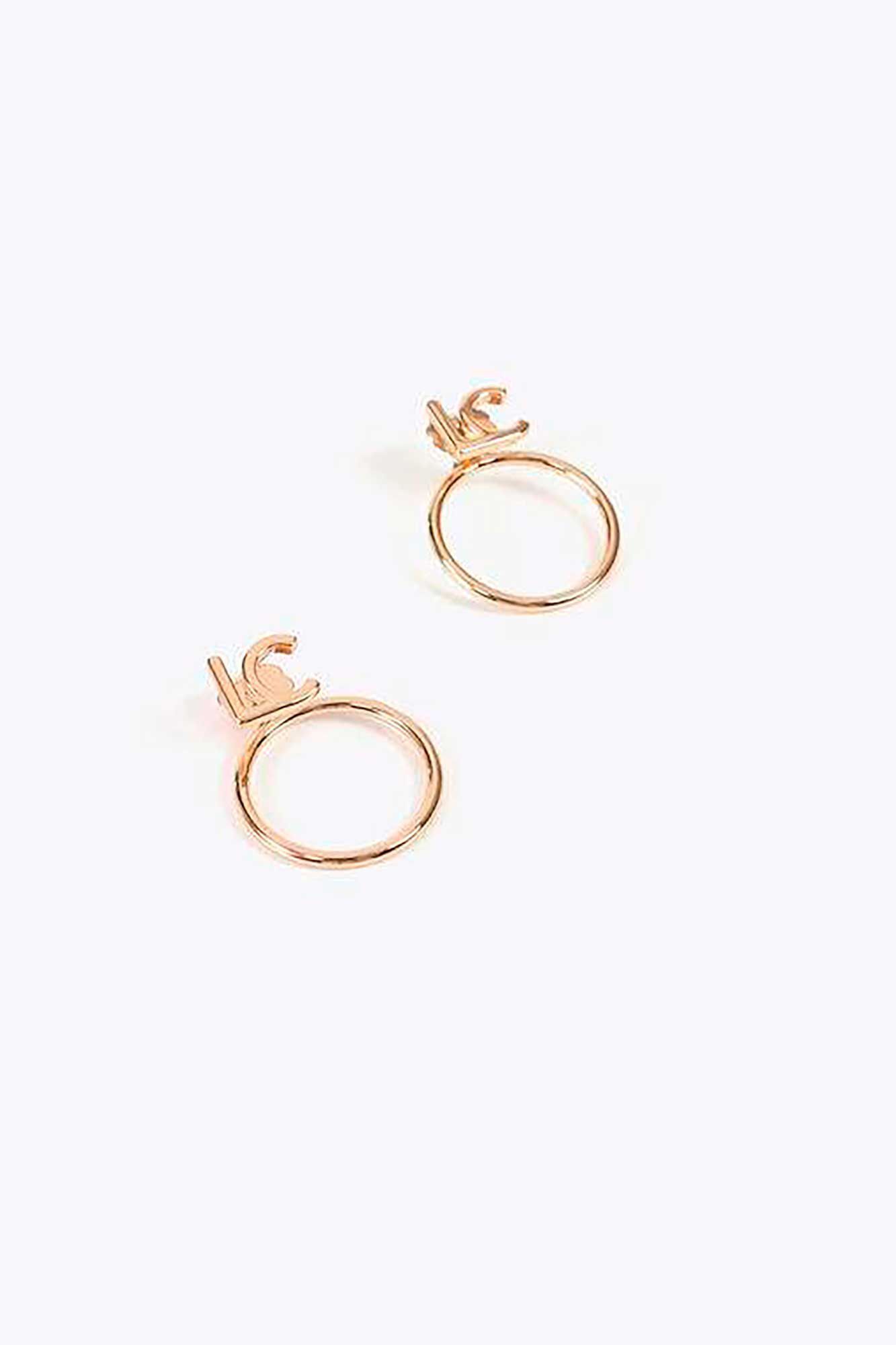 Lola Casademunt Brincos de logo