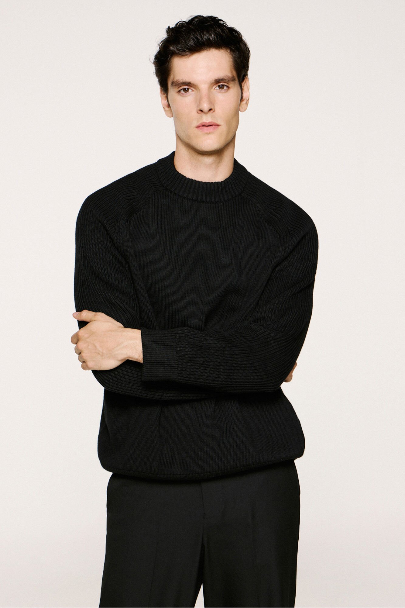 Selected 100% organic cotton mock neck jumper .  Black