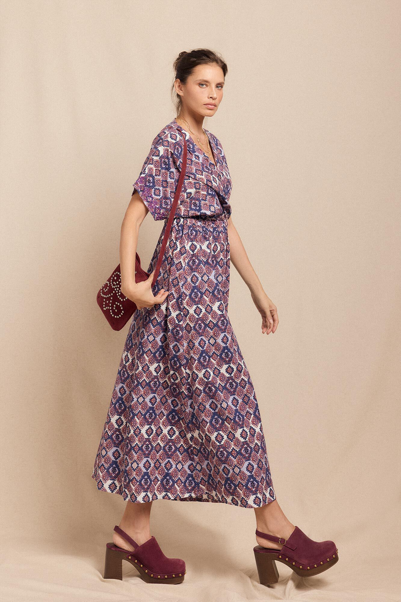 Slowlove Bolsa para telefone com tachas