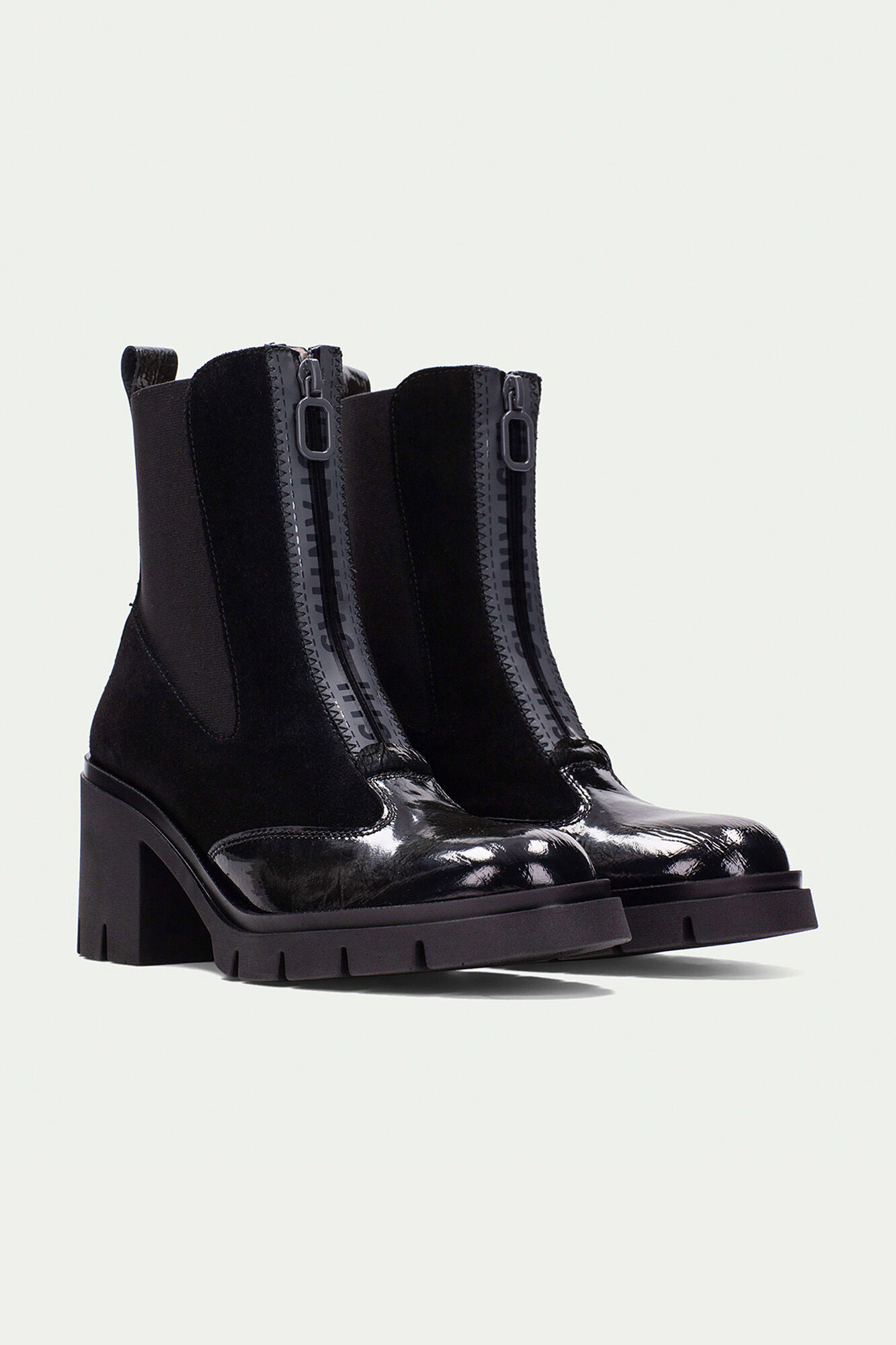 Hispanitas Botins de fecho-&eacute;clair curto com z&iacute;per central e sola de corrida em Zurique