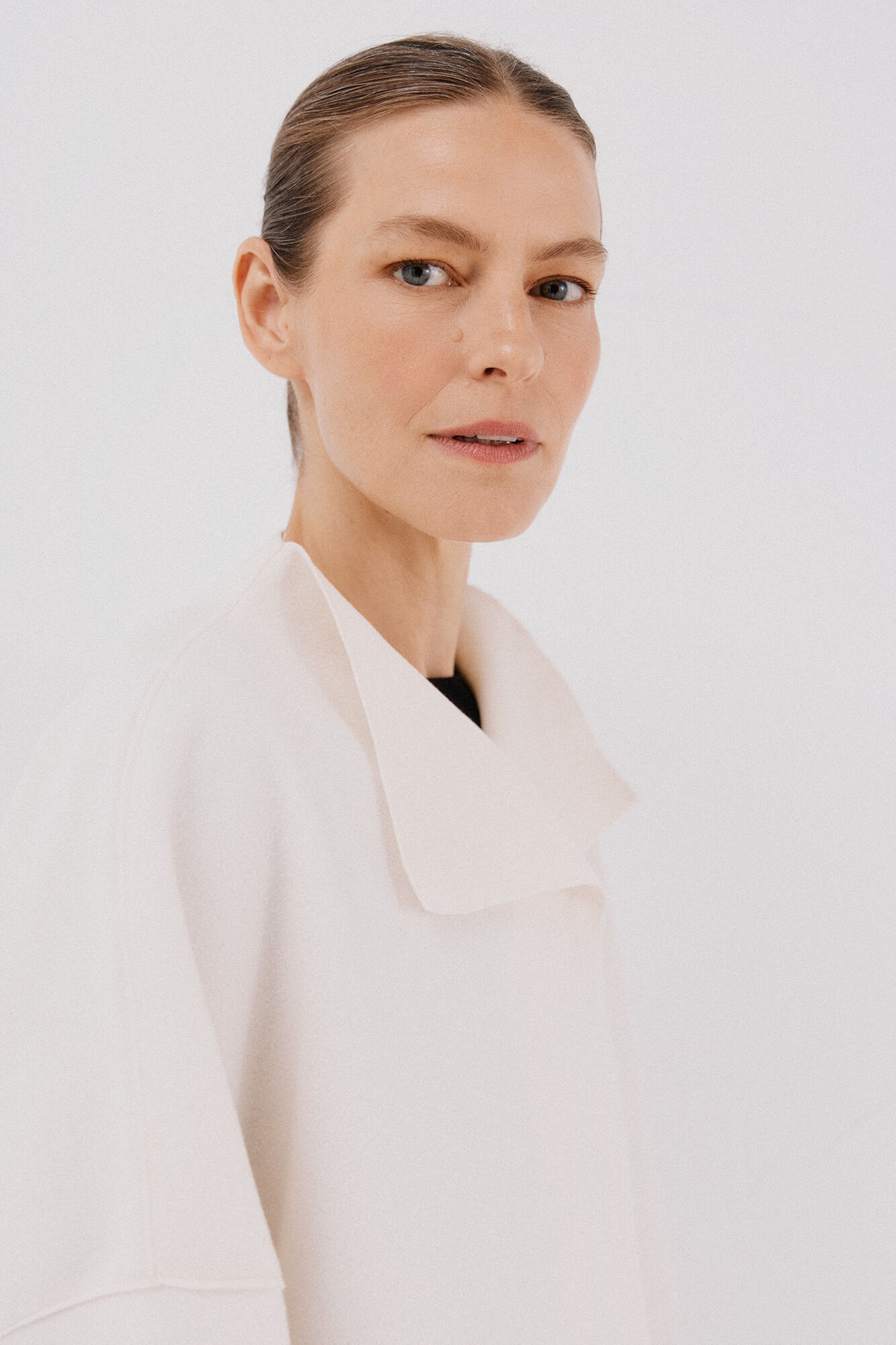 Cortefiel Cape coat with light fabric Ivory