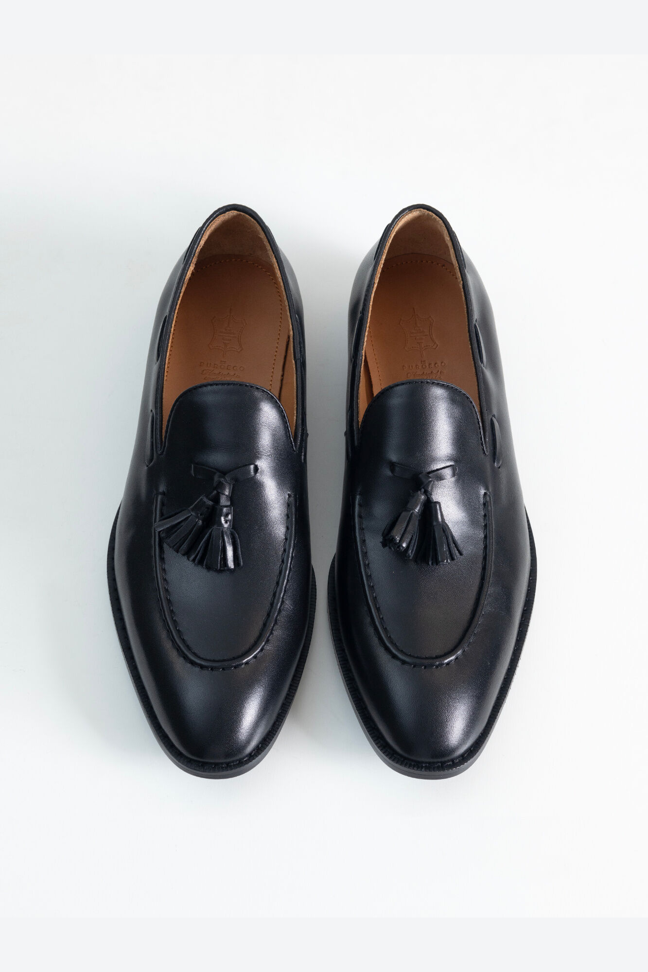 PuroEGO Mocassim em pele com borlas