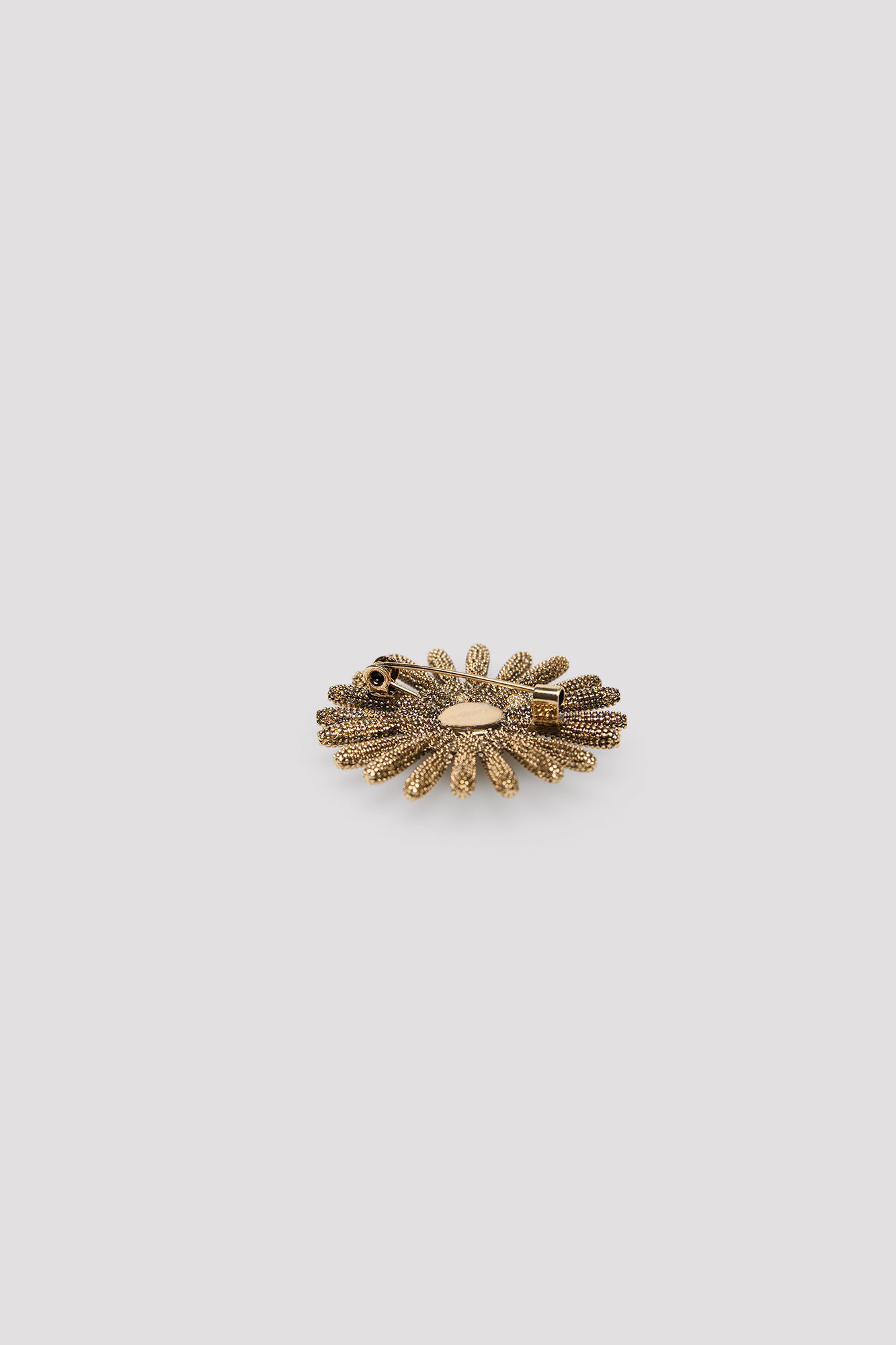 Cortefiel Resin sun brooch
