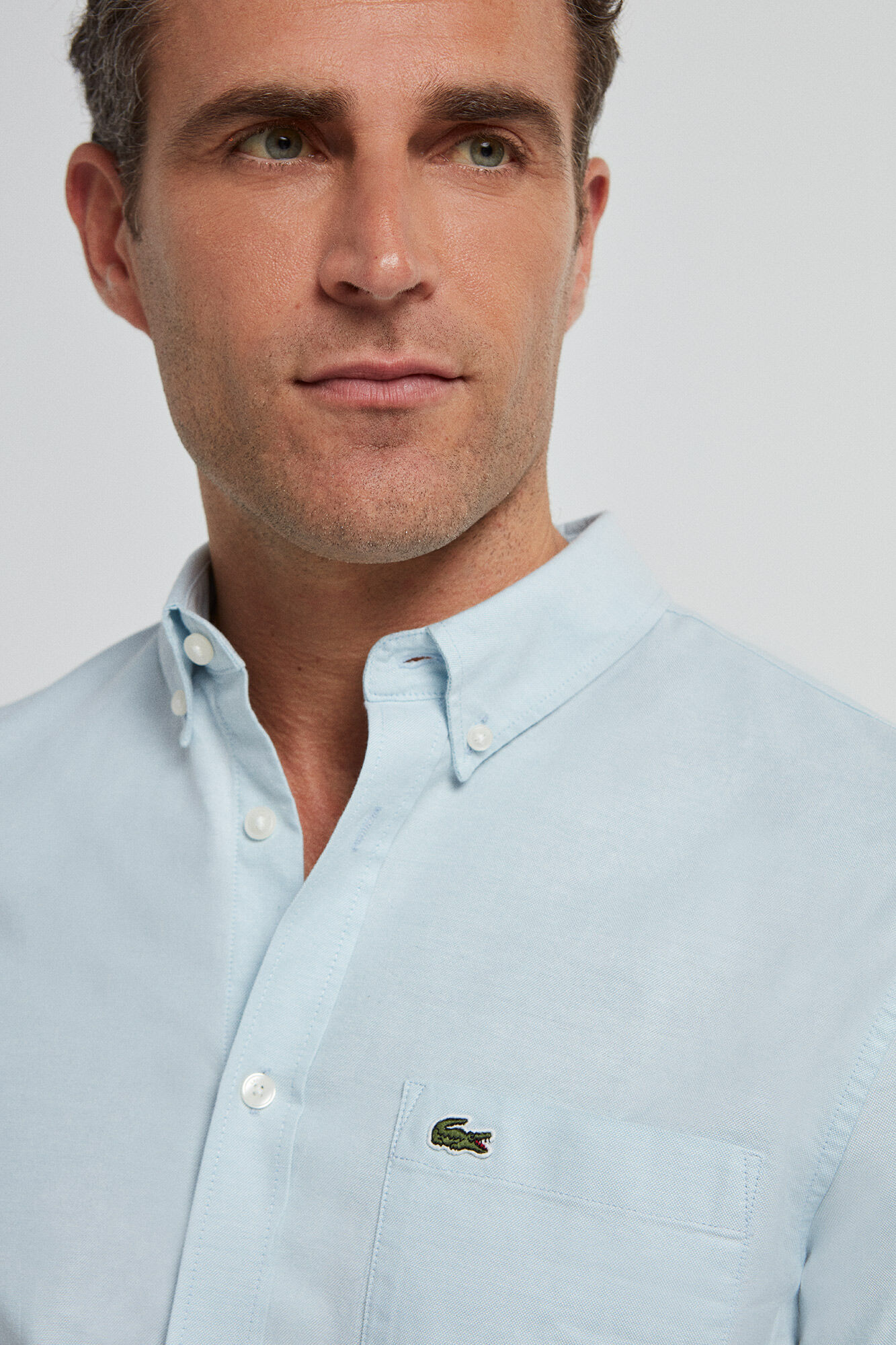 Lacoste Camisa azul-claro com gola de bot&atilde;o Azul