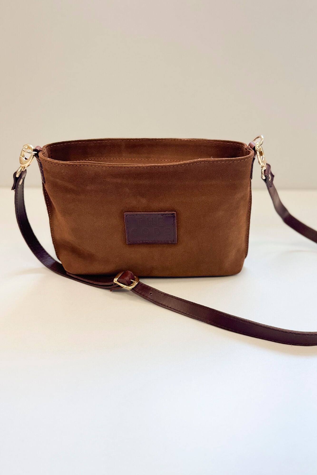 The Code Bolsa a tiracolo Dakota em croute Castanho