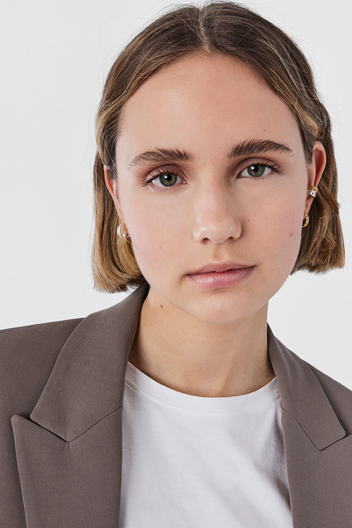 Tous Pendientes aro con ba&ntilde;o de oro 18 kt sobre plata peque&ntilde;os con silueta TOUS Bear Row Amarillo