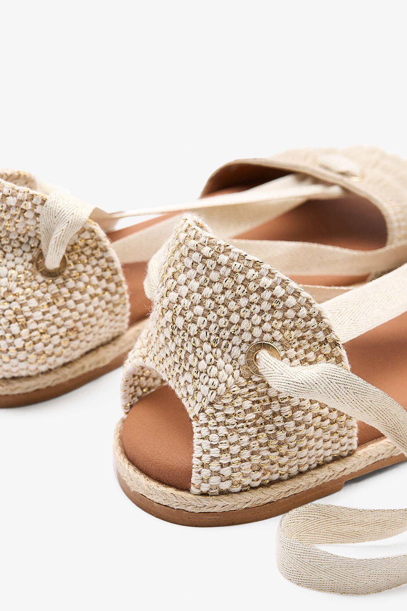 Popa Poipu fringed flat sandal Gold