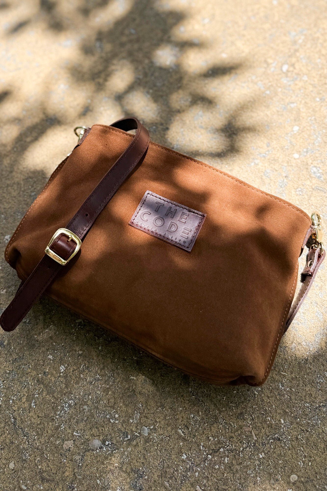 The Code Bolsa a tiracolo Dakota em croute Castanho