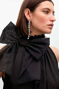 Lola Casademunt Brincos com joia