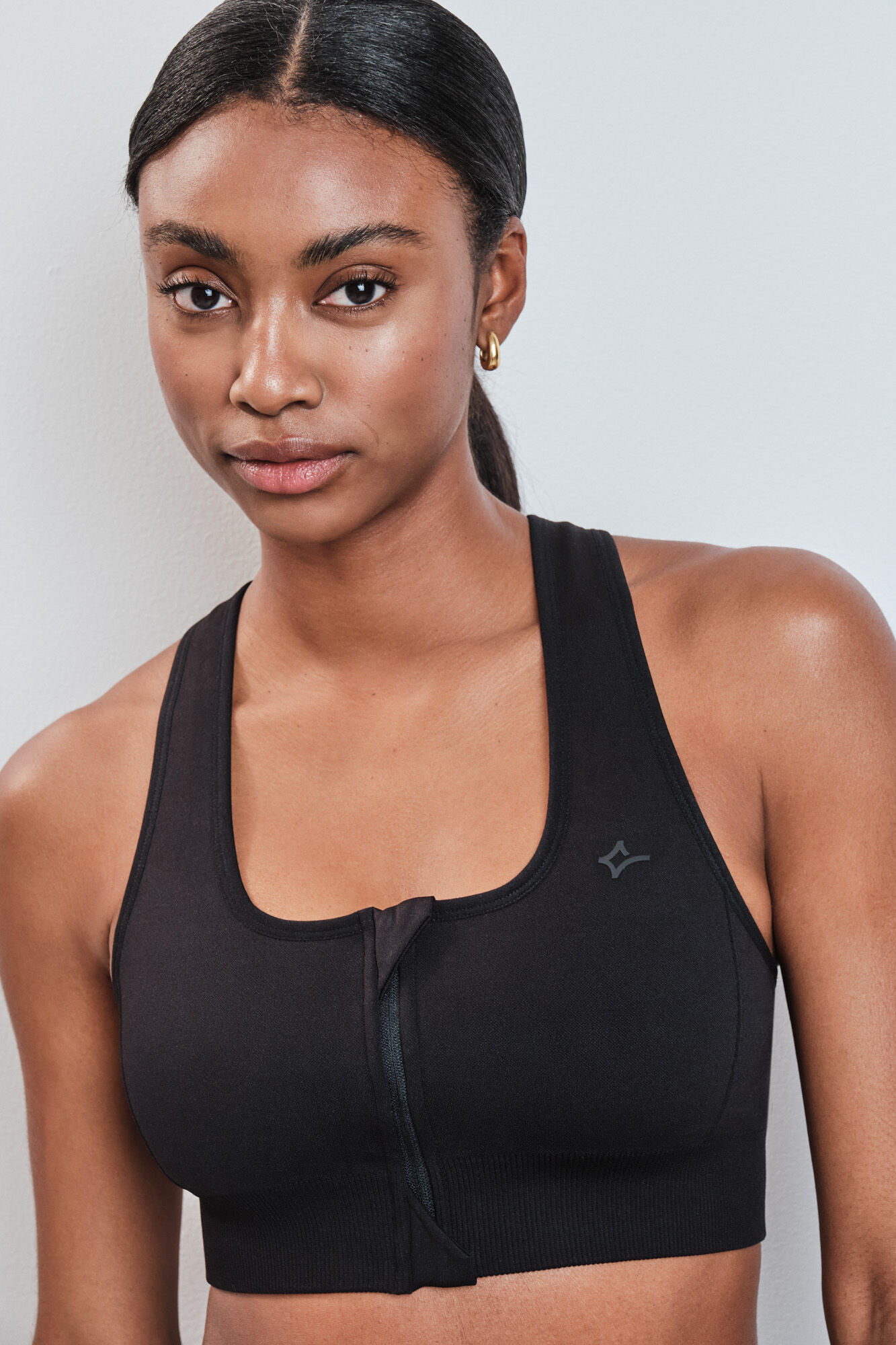 Dash and Stars Sujetador deportivo negro cremallera central SEAMLESS FIT