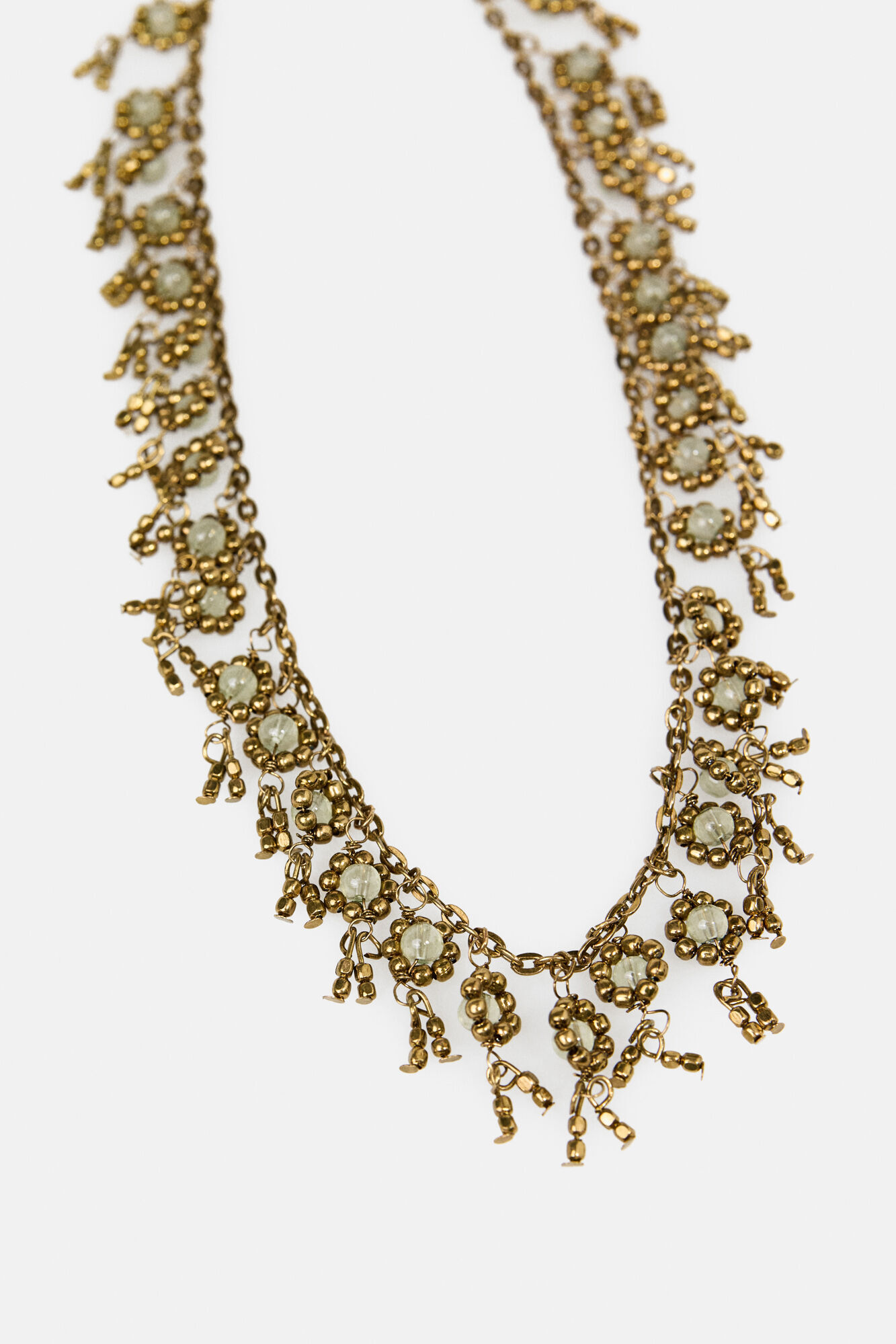 Hoss Intropia Lubna. Collar corto flores ba&ntilde;ado en oro