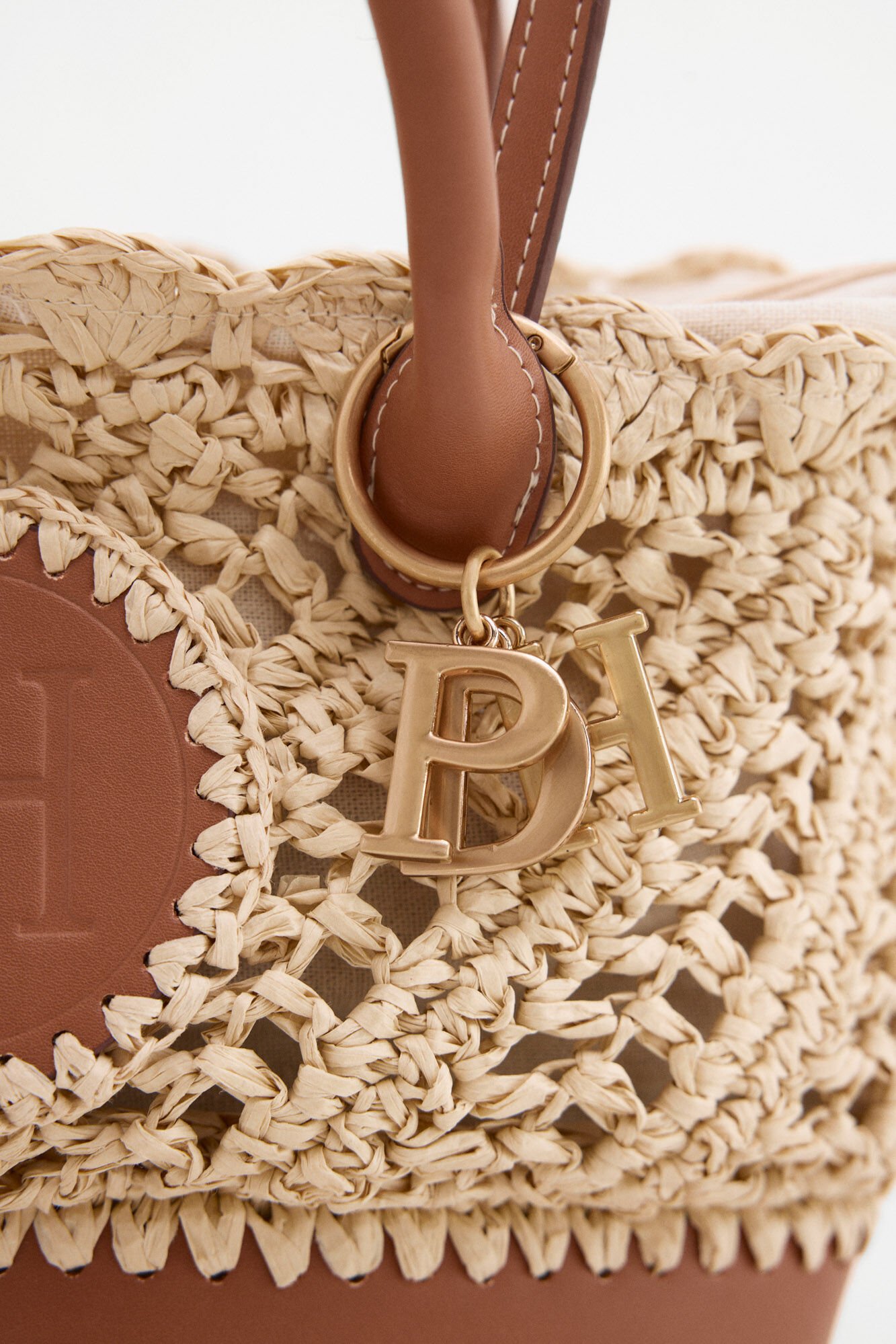 Pedro del Hierro Raffia-effect braided logo basket bag Ecru
