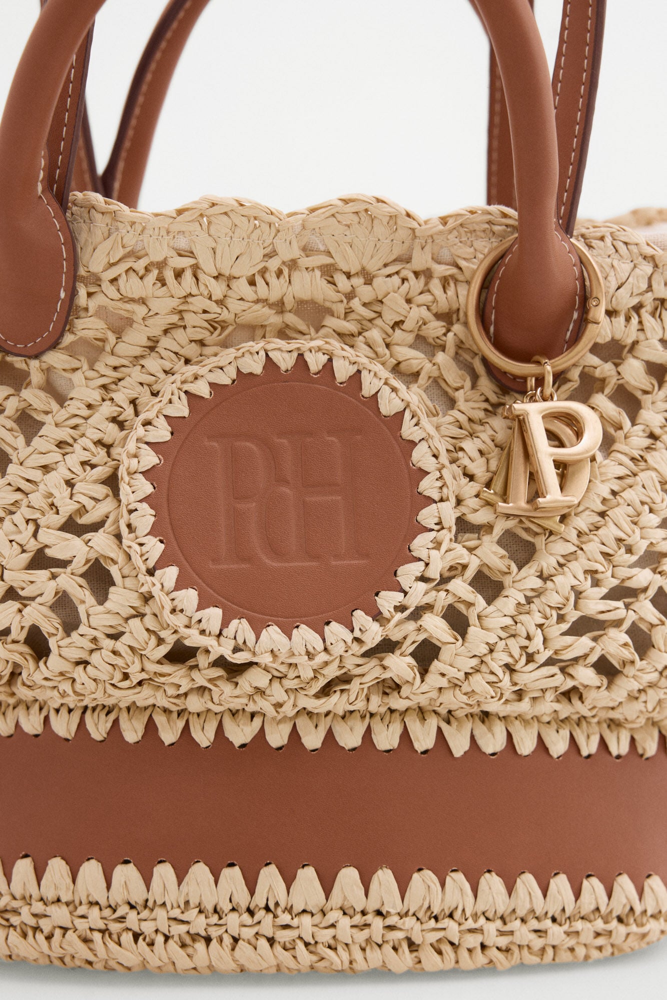 Pedro del Hierro Raffia-effect braided logo basket bag Ecru