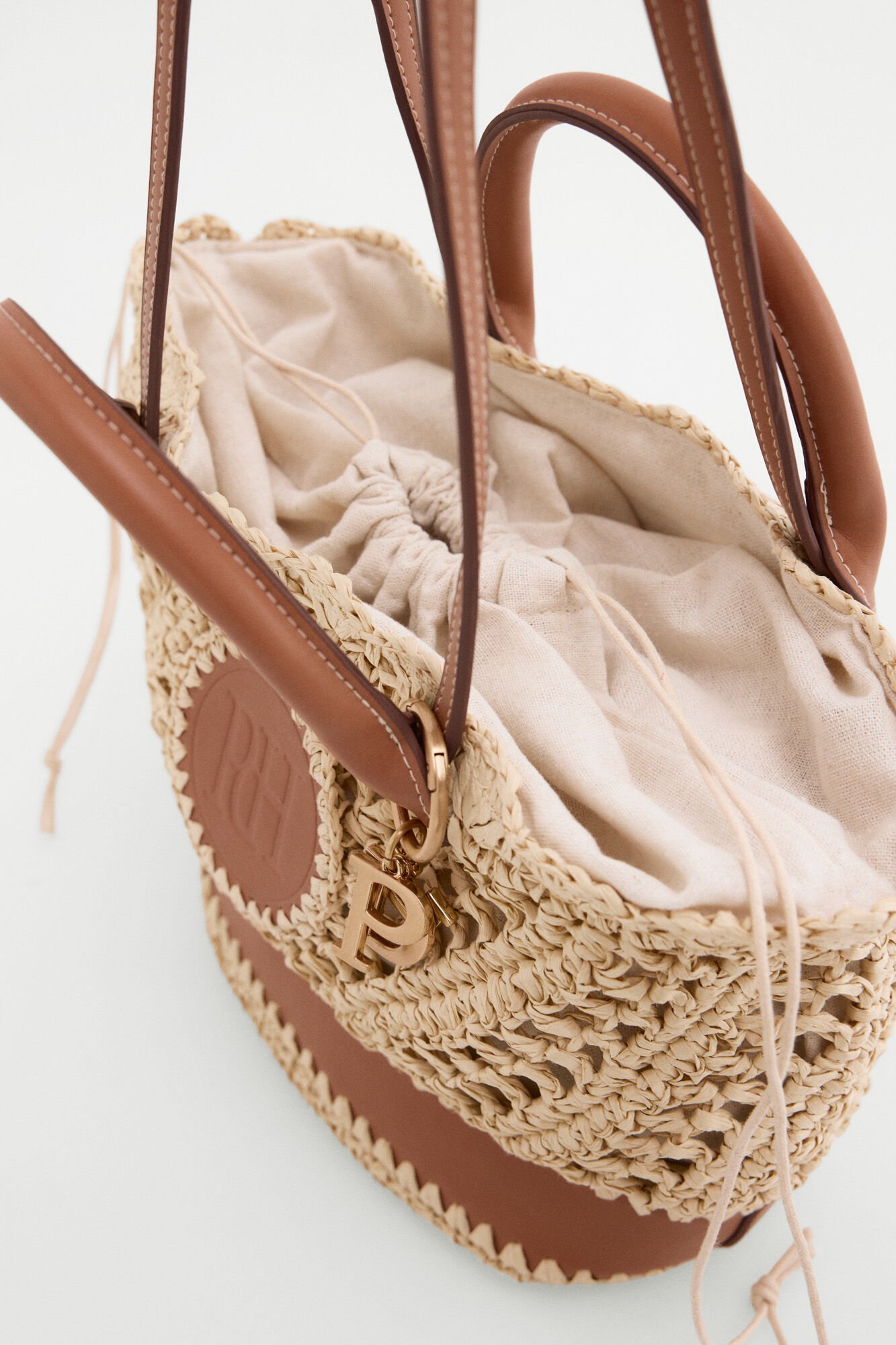 Pedro del Hierro Raffia-effect braided logo basket bag Ecru