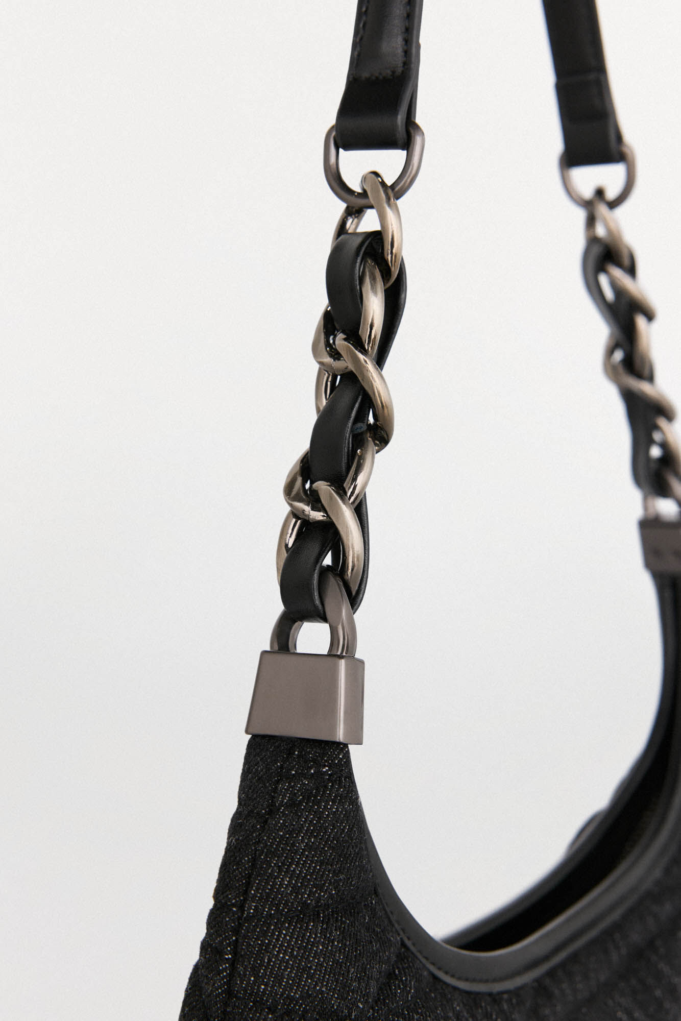 Pedro del Hierro Quilted hobo bag with leather handle and chain Black