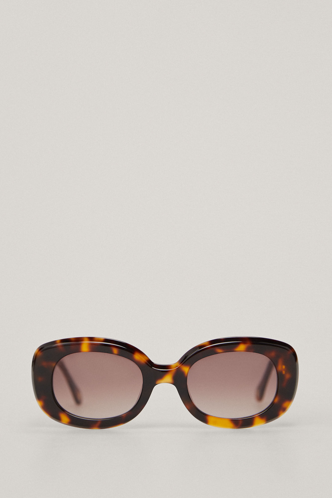 Pedro del Hierro Gafa De Sol Ovalada Efecto Carey Marr&oacute;n