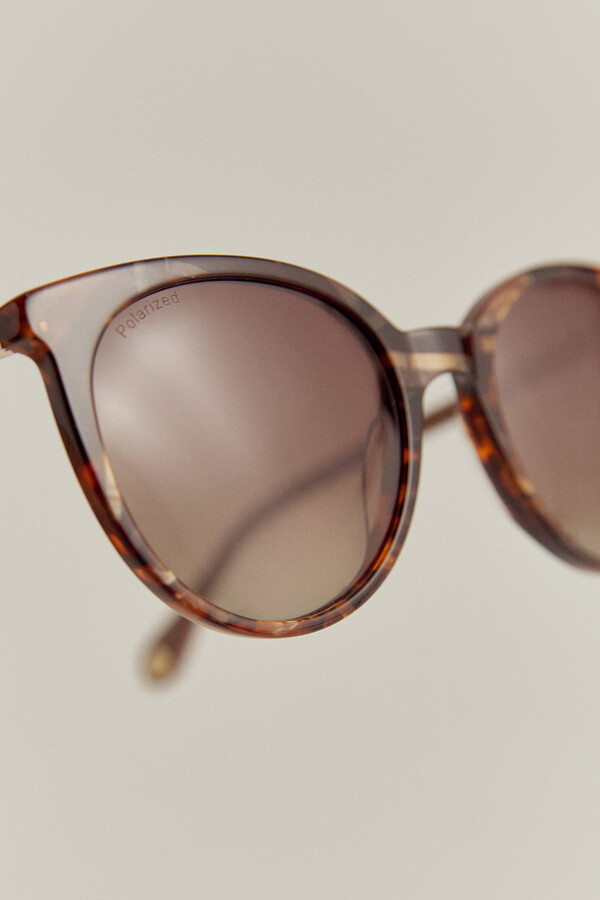 Pedro del Hierro Essential tortoiseshell sunglasses with dusty pink temples. Brown