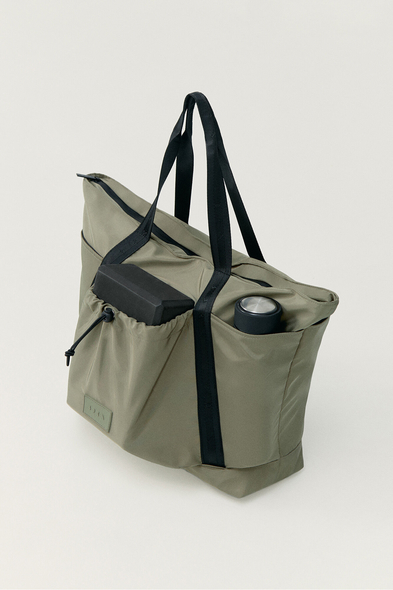 Born Living Yoga Bolso multiusos Away kaki