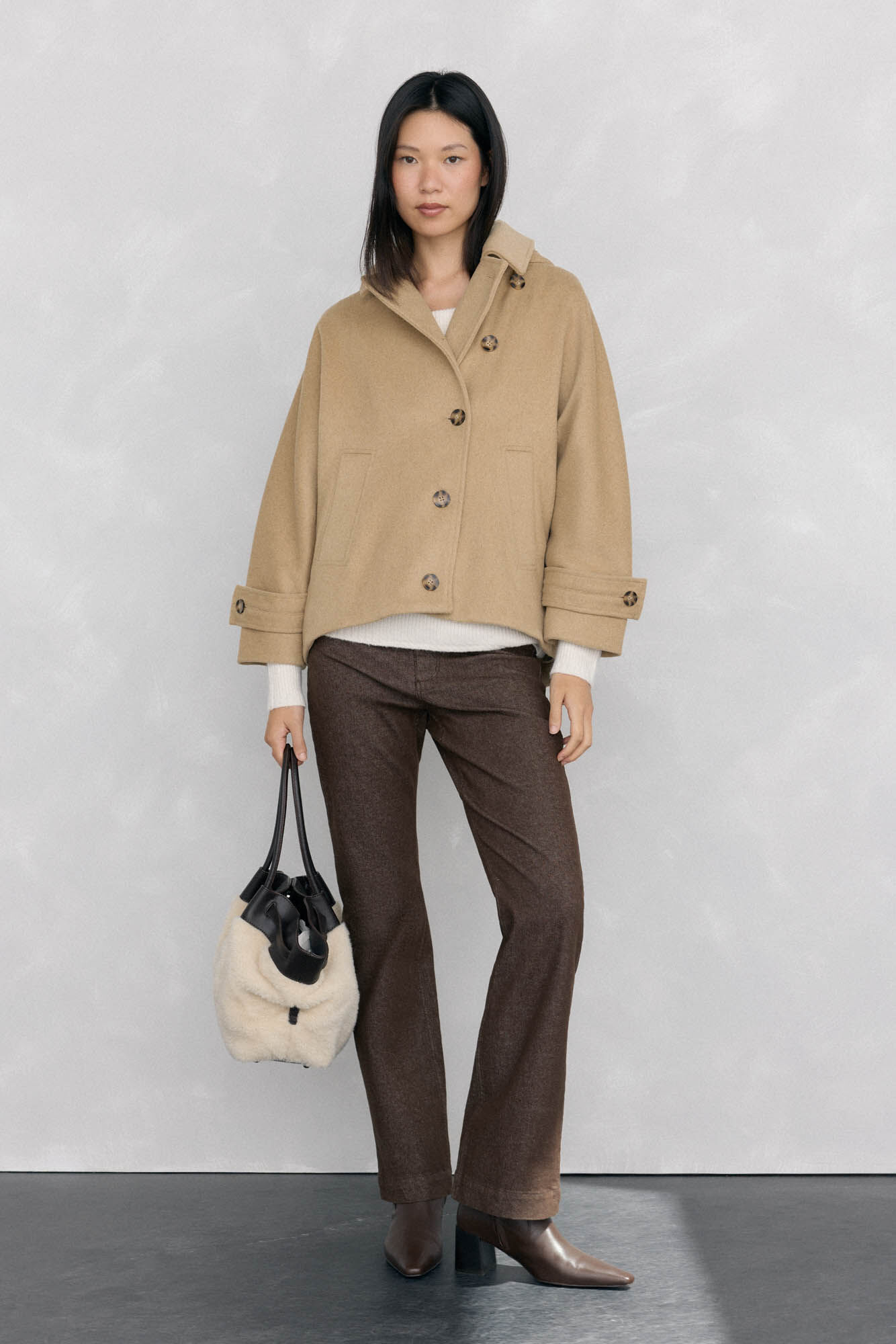 Conjunto de cal&ccedil;a, jaqueta e su&eacute;ter