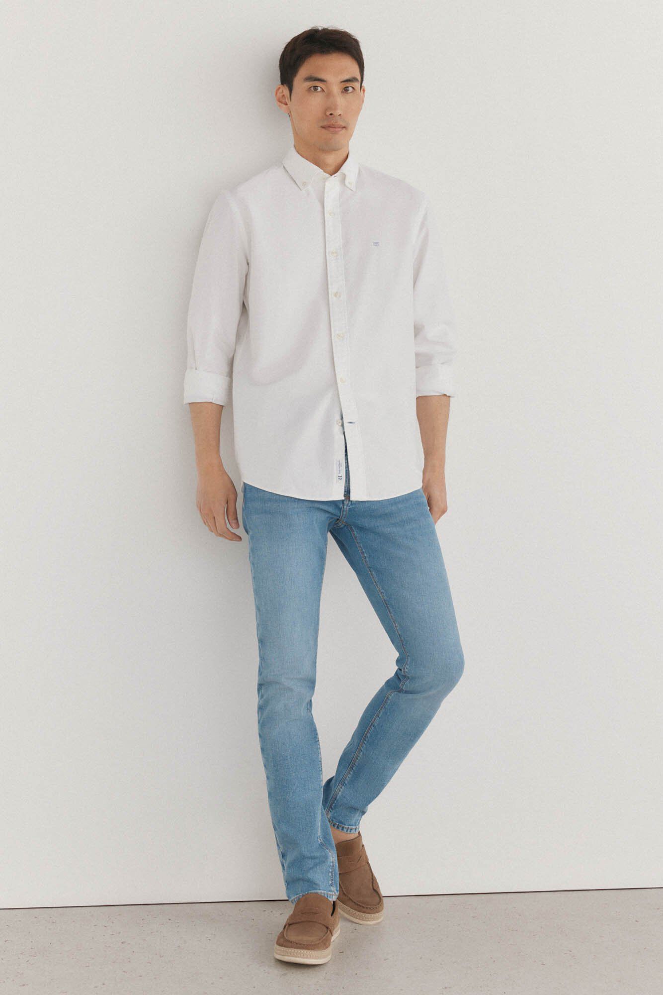 Conjunto de cal&ccedil;as e camisa