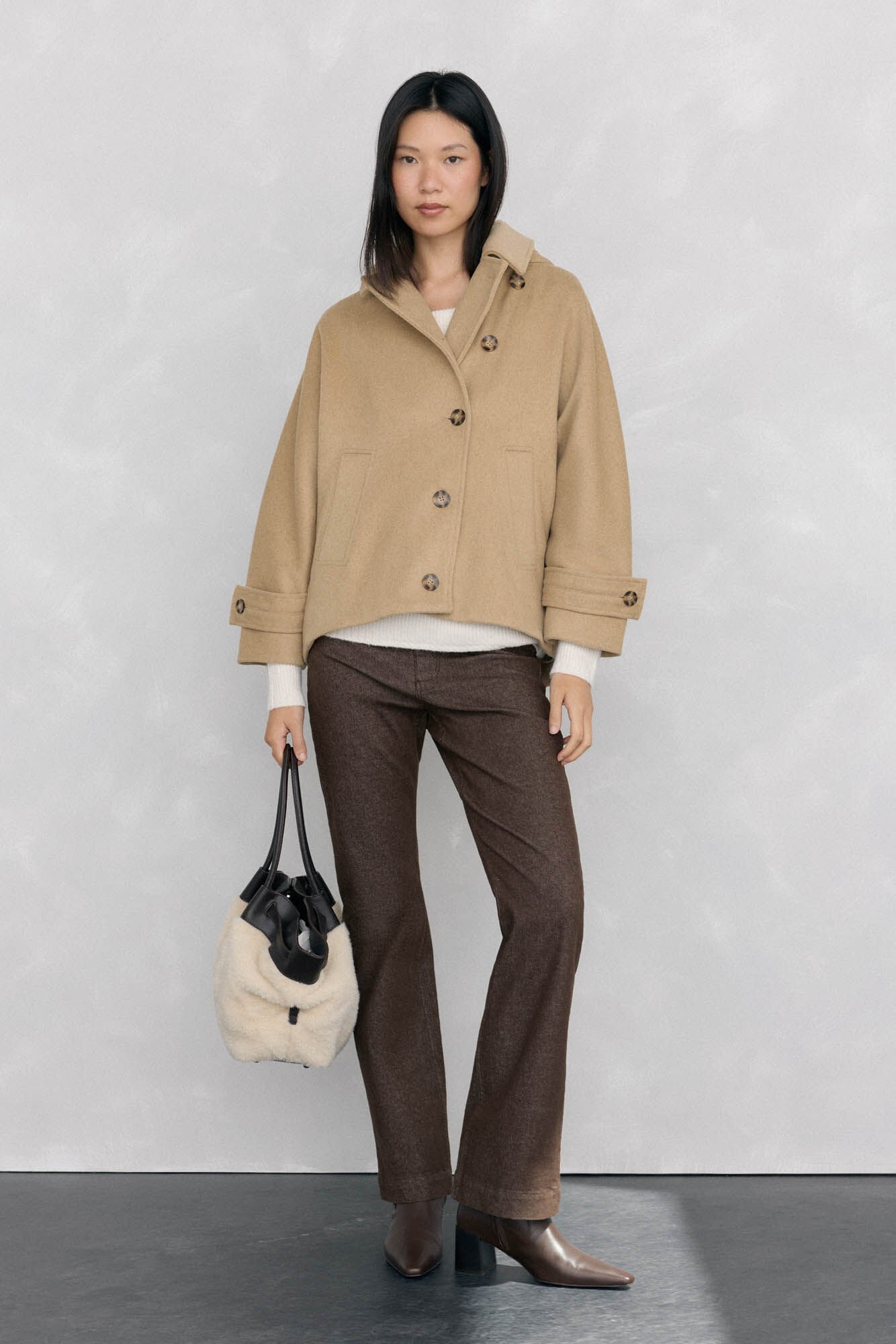 Conjunto de cal&ccedil;a, jaqueta e su&eacute;ter