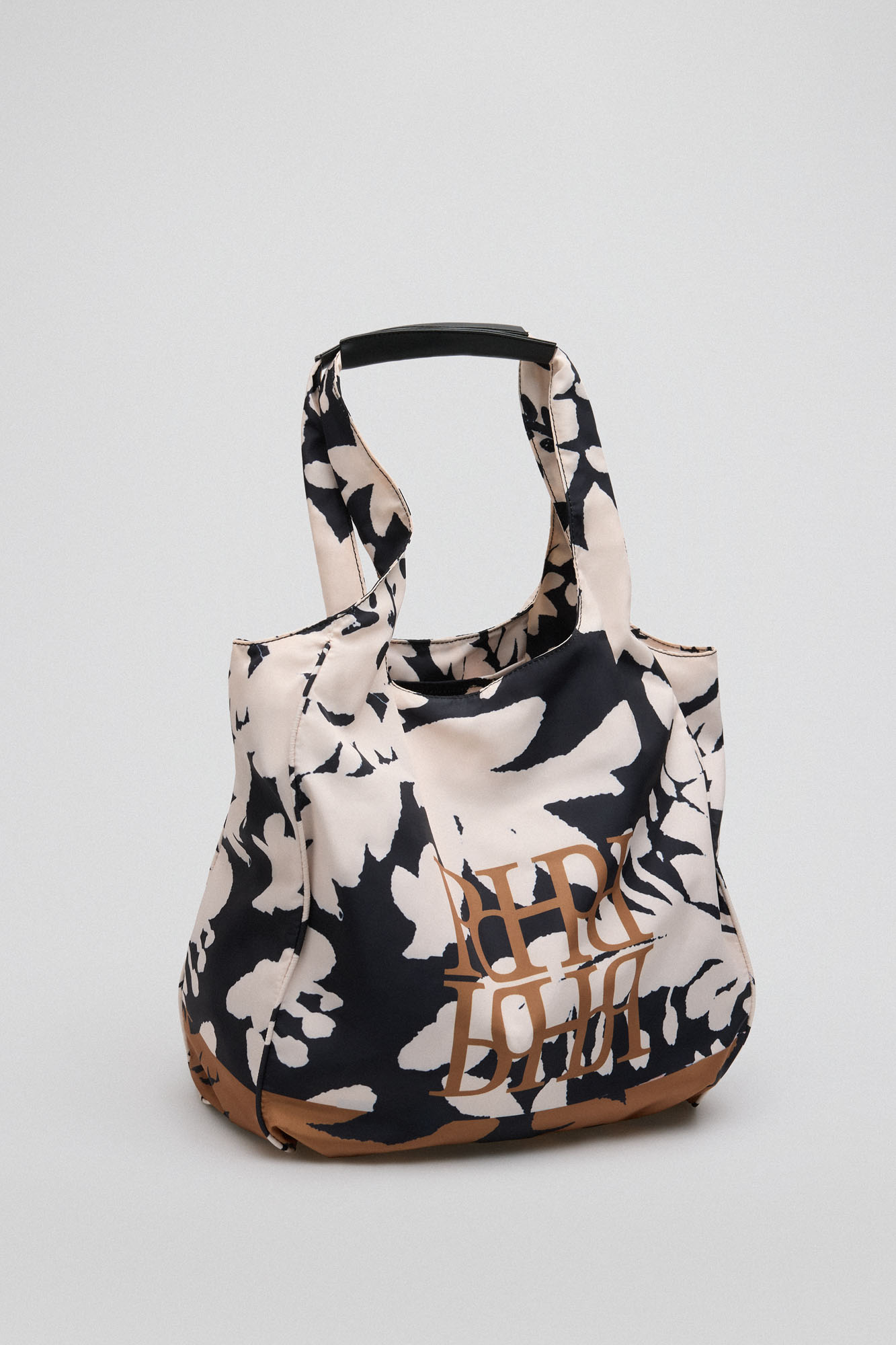 Bolsa estampada em nylon